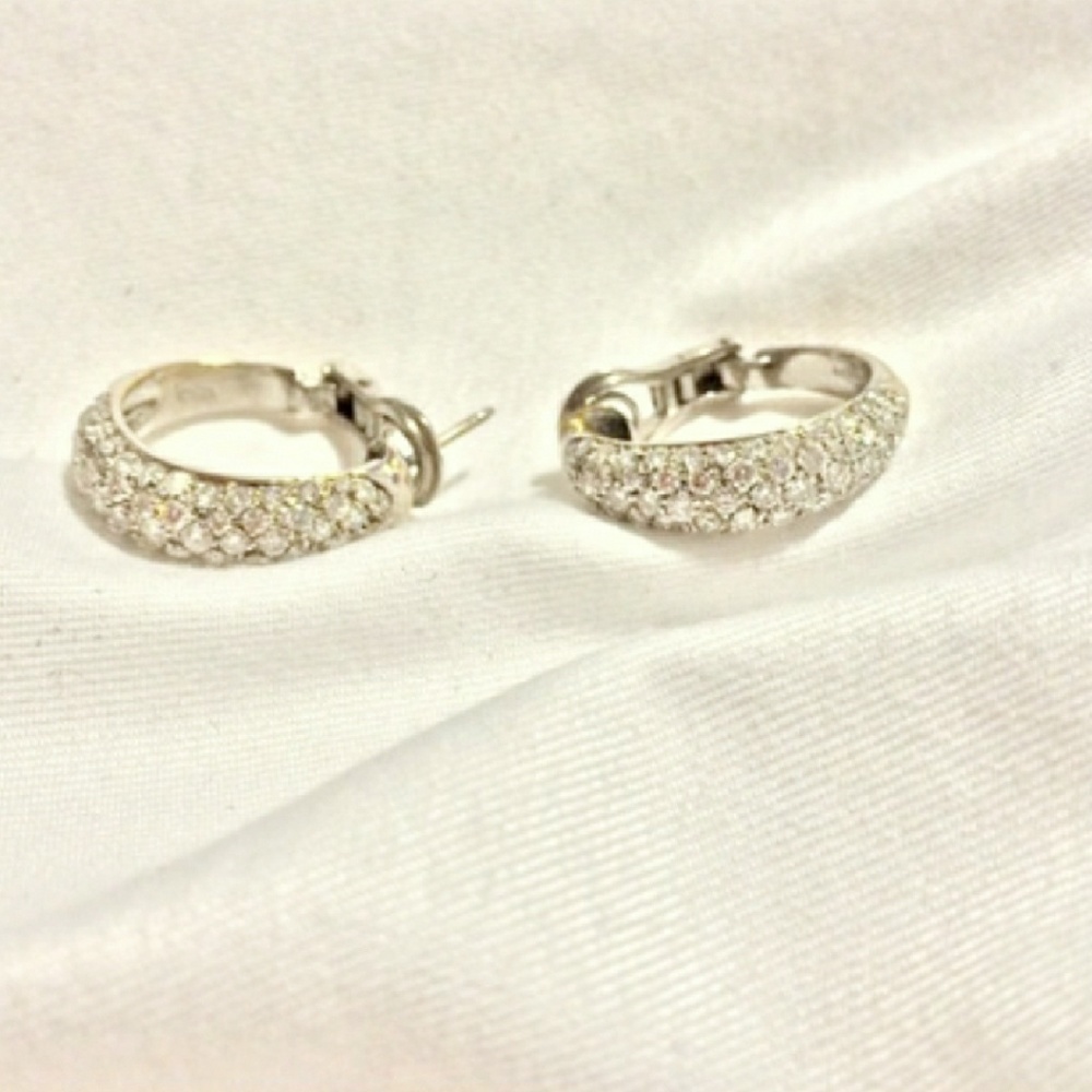 Pair of platinum and diamond hoop earrings.